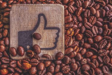 Why I Like Everything Mind Hack thumbs up with coffee